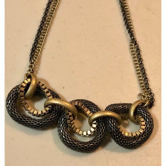 Kenneth Cole New York with interesting interlinking rings of different materials - Picture 2 of 4